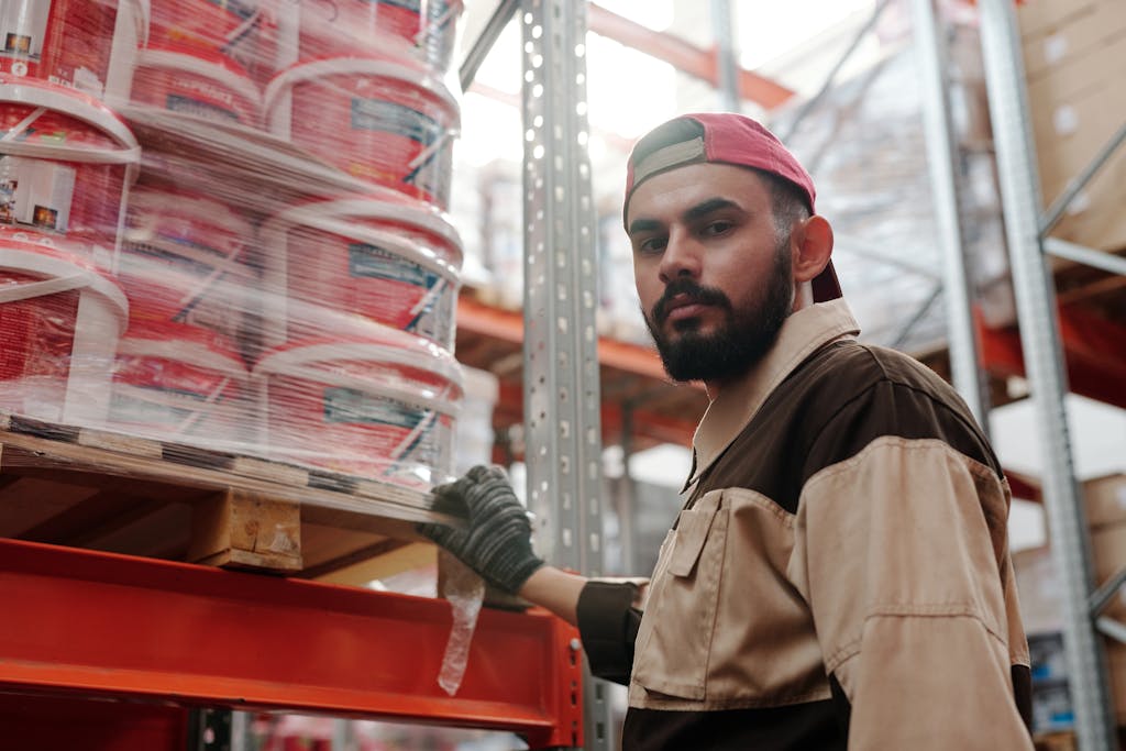 Man Working with Construction Materials